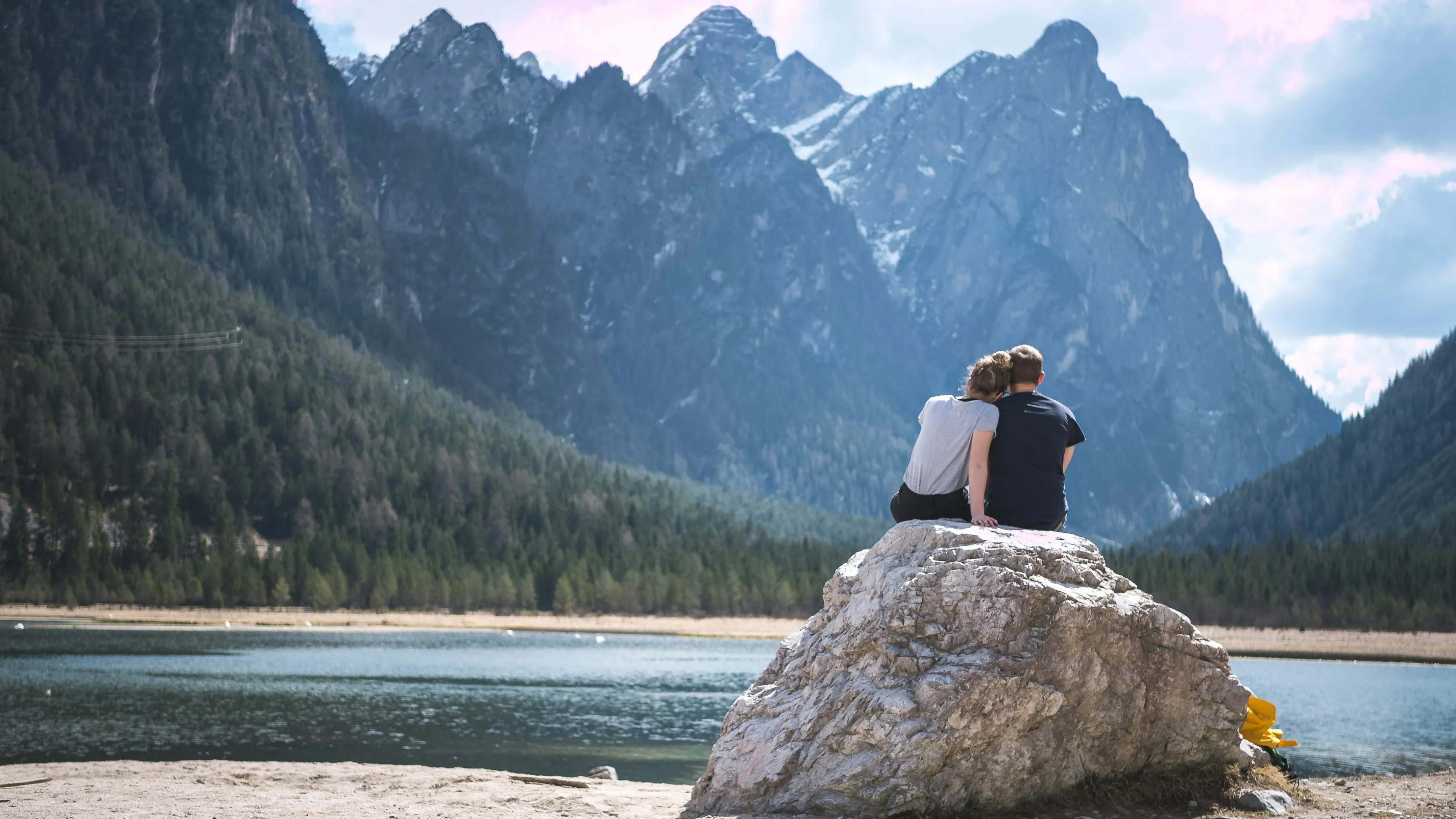 Couple enjoying a peaceful moment by the lake